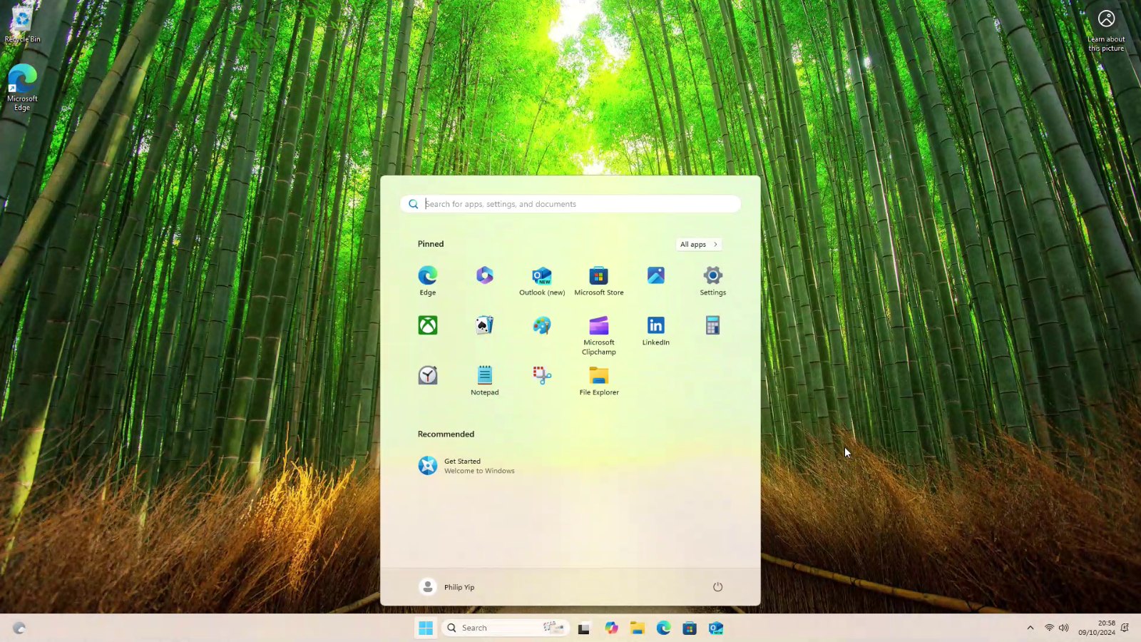 Windows 11 desktop with the Start menu open after installation and first-time setup are complete